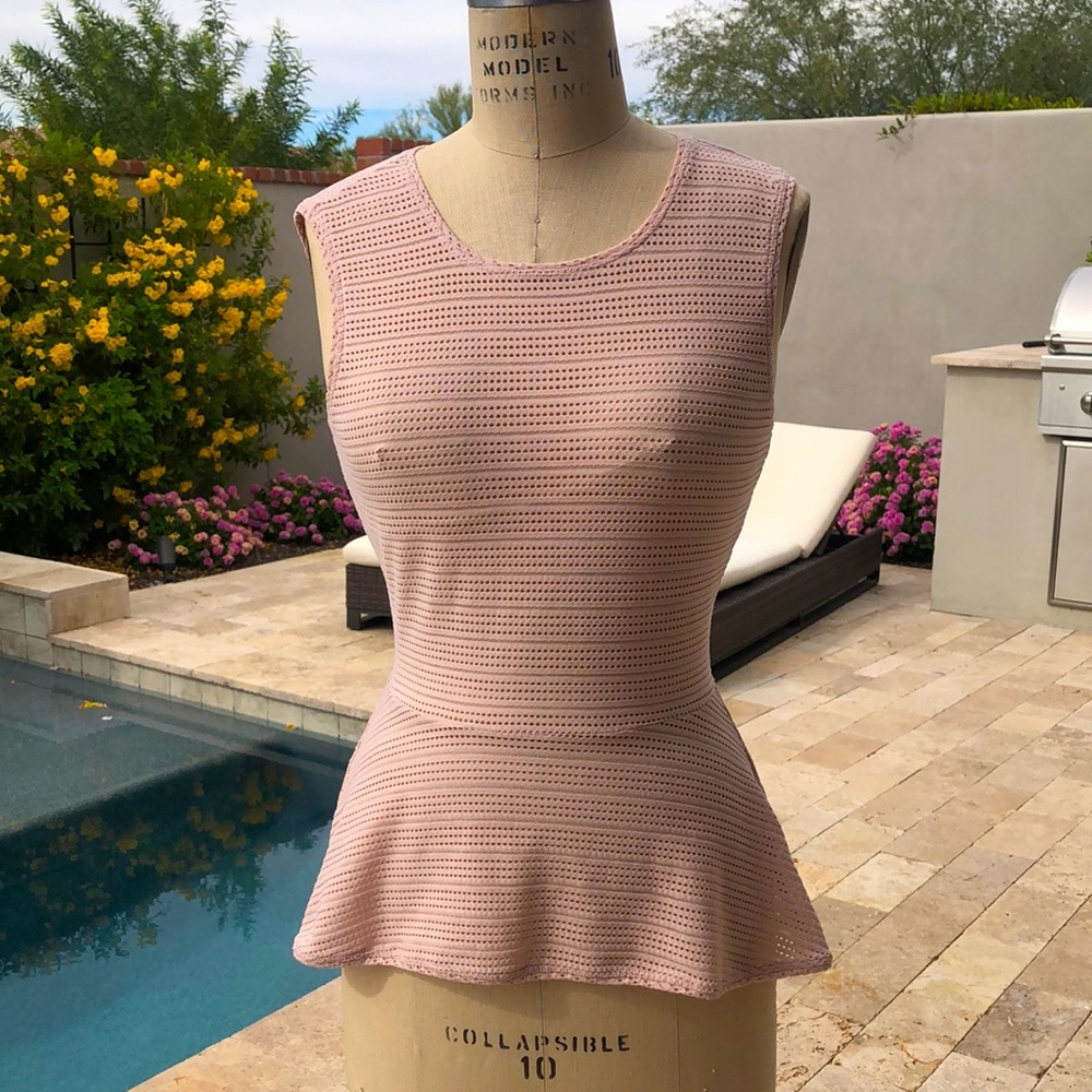 BCBG top zip up back size small.  Brand new